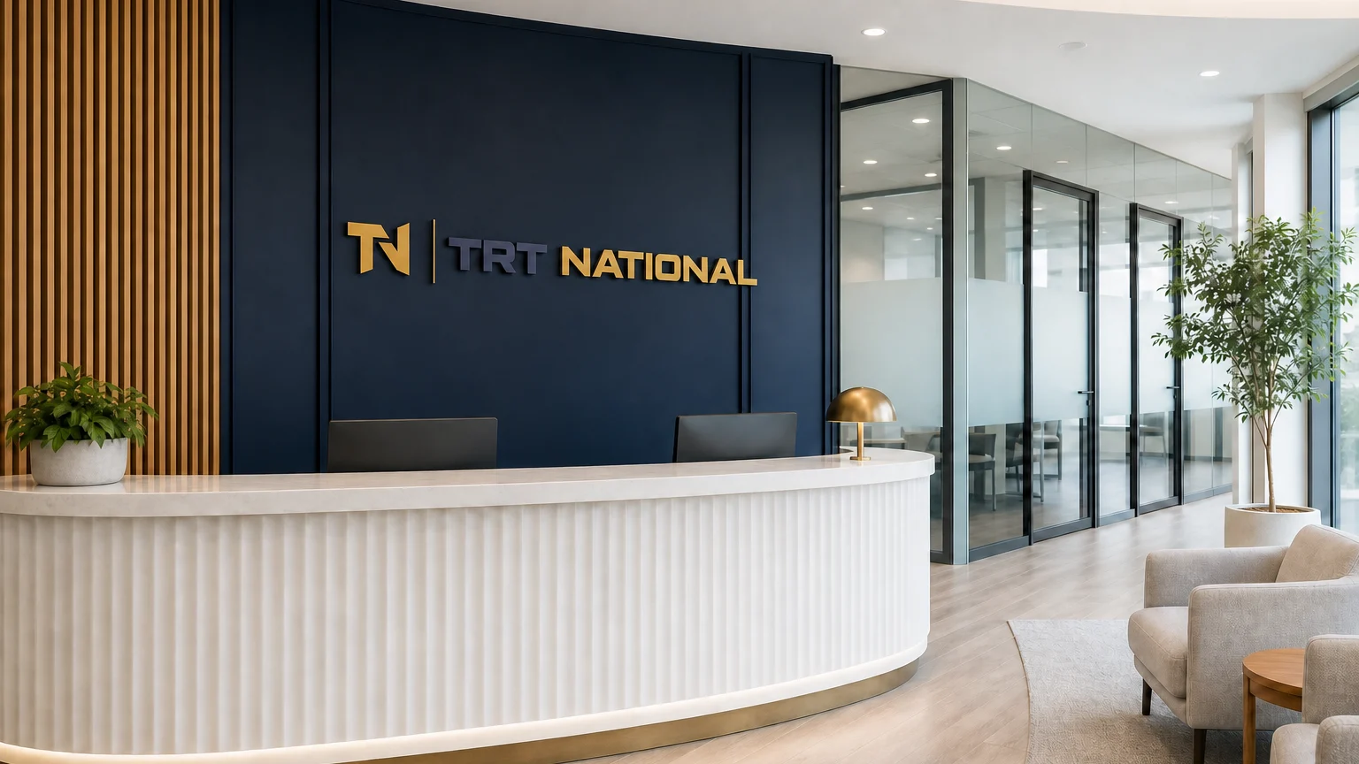 Bright modern clinical welcome space with TRT National branding